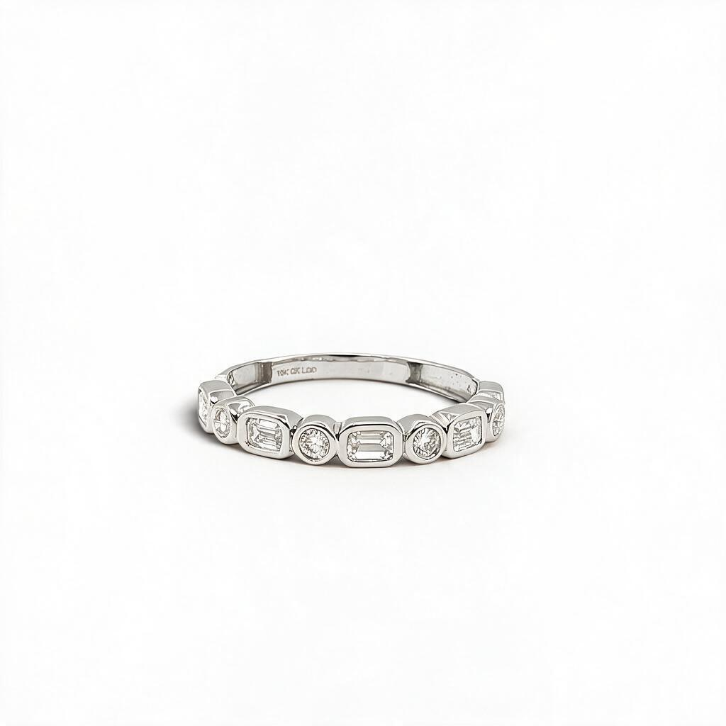 Bijoux Village Fine Jewellers 10K white gold half-eternity band with alternating baguette and round lab diamonds.