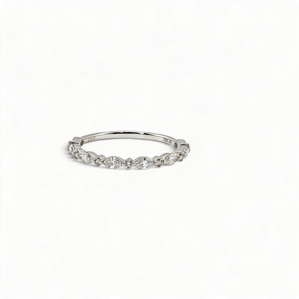 Bijoux Village Fine Jewellers 10K white gold half-eternity band with alternating marquise and round lab-grown diamonds.