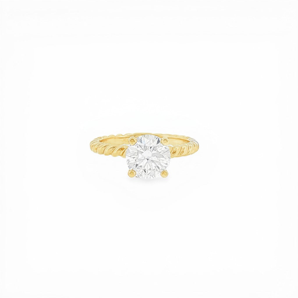 Bijoux Village Fine Jewellers 1.73 CT round brilliant solitaire ring in 18K yellow gold with rope design band.