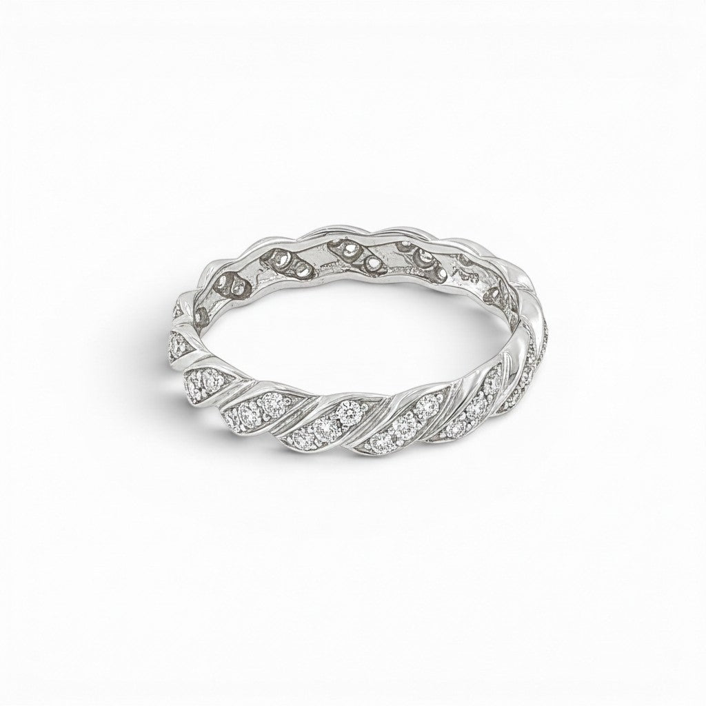 Bijoux Village Fine Jewellers 18K white gold twisted eternity band with pavé set round brilliant diamonds.