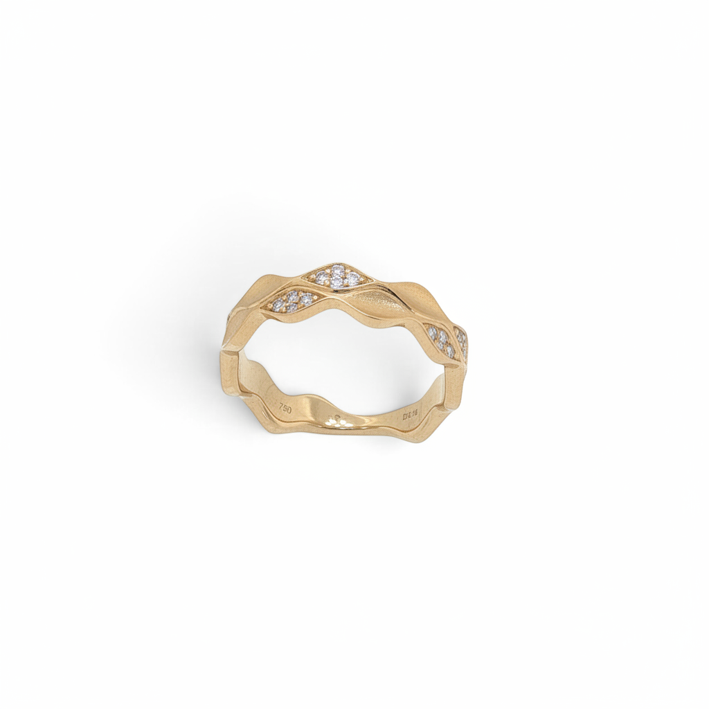 Bijoux Village Fine Jewellers 18K yellow gold wave band featuring pavé-set round brilliant natural diamonds.