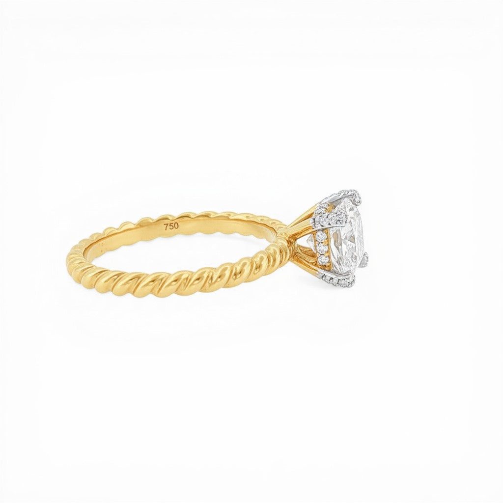 Bijoux Village Fine Jewellers 1.73 CT round brilliant solitaire ring in 18K yellow gold with rope design band.