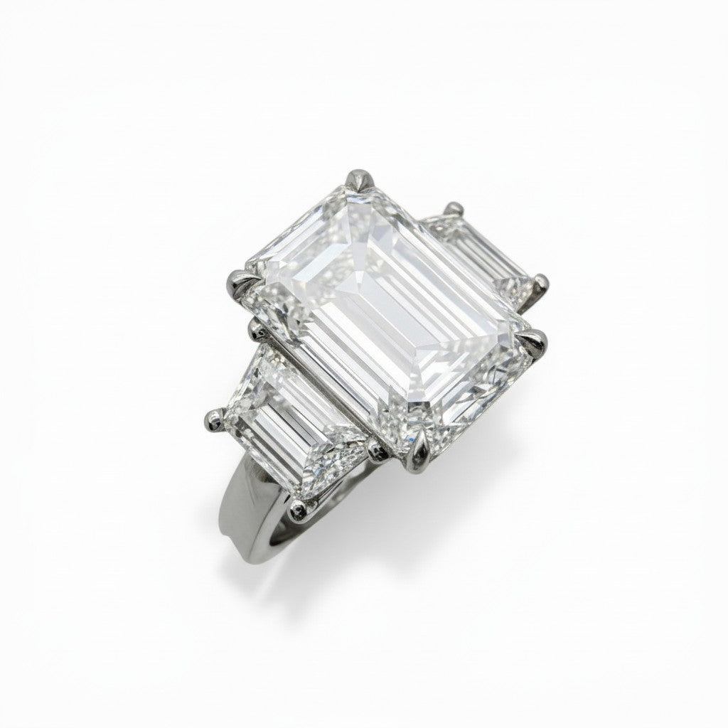 Diamond ring with emerald-cut center with step-cut side stones-Bijoux Village Fine Jewellers