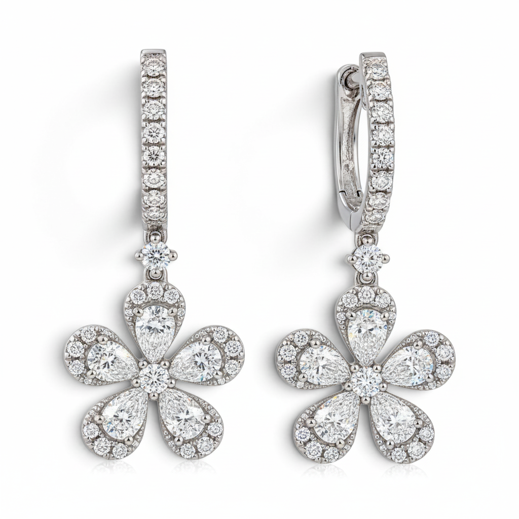 Bijoux Village Fine Jewellers 18K white gold floral drop earrings with pear and round diamond petals on huggie hoops.