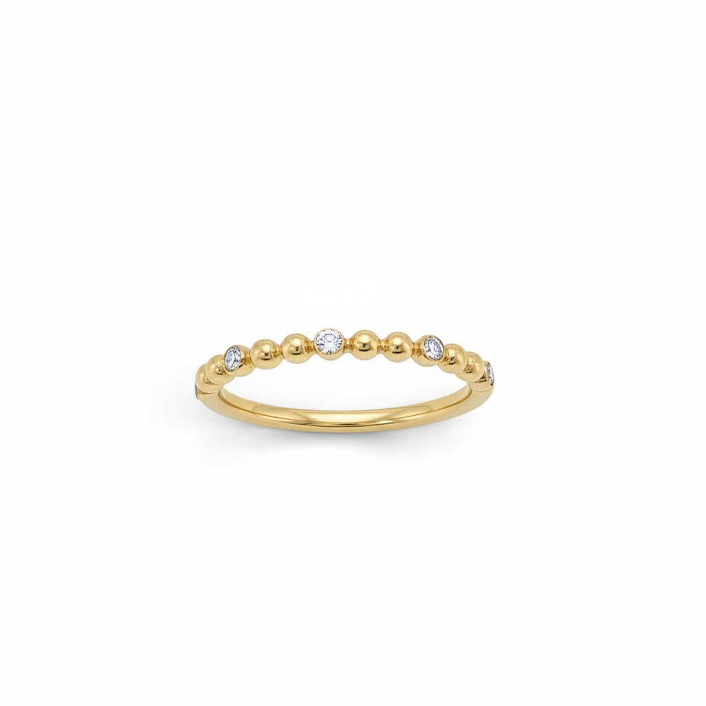 Bijoux Village Fine Jewellers 10K yellow gold stacking ring with bezel-set lab-grown diamonds and a beaded design.