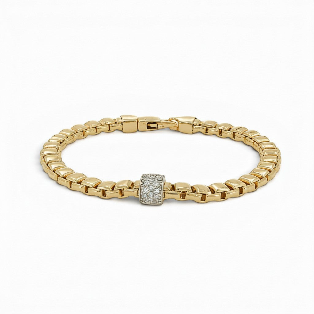 Bijoux Village Fine Jewellers 14K yellow gold Italian link bracelet with a pavé-set diamond centre link.