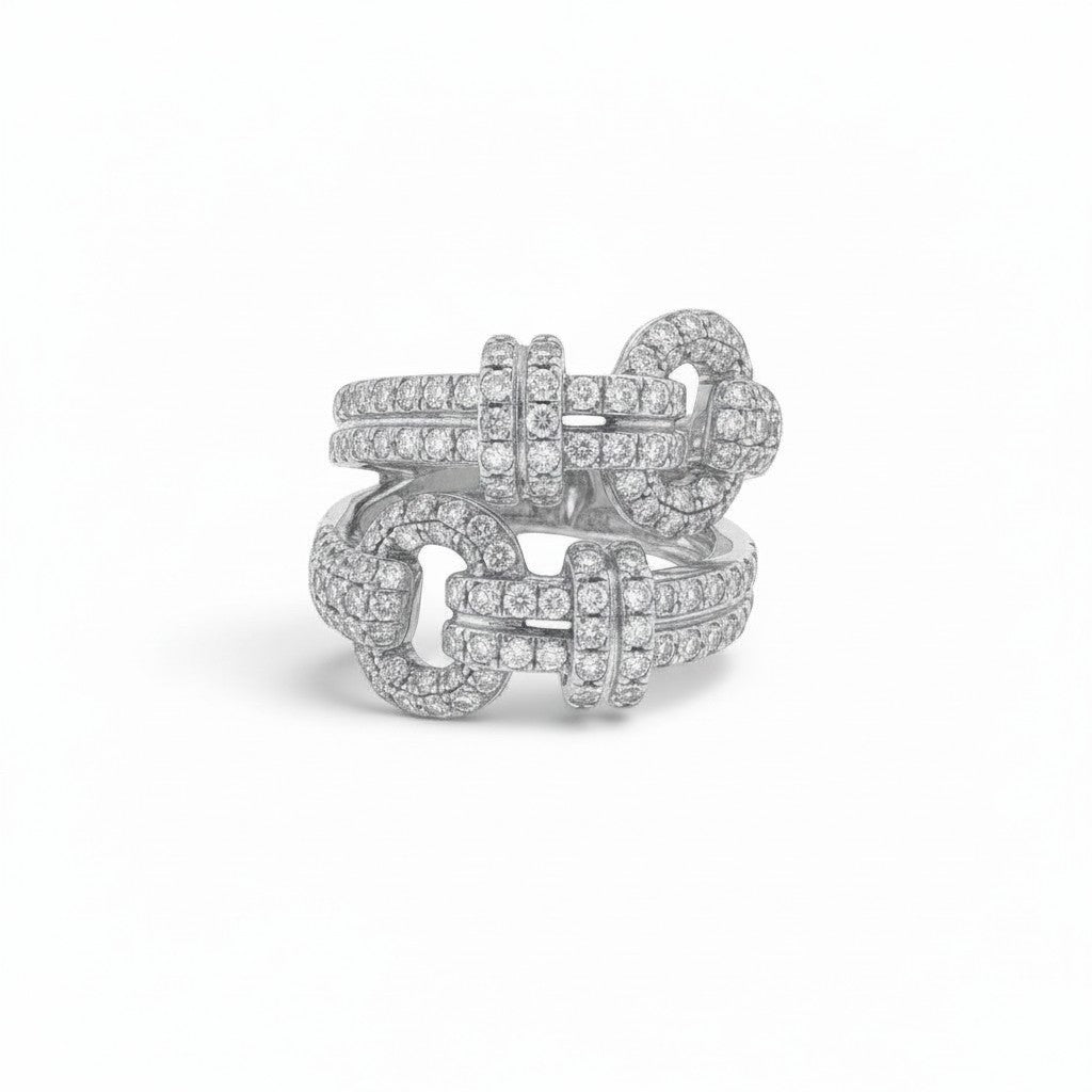 Bijoux Village Fine Jewellers 18K white gold buckle ring featuring 1.55 carats of pavé-set round brilliant diamonds.